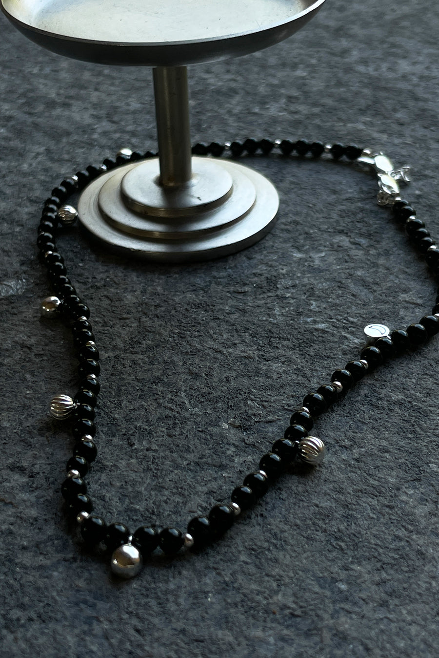 Black Bead Necklace With Silver Pendants